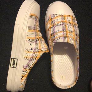 Multi color water shoe just slip on and go.